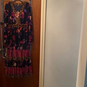 Floral and Animal Print Maxi Dress by designer Iman. Never worn. Dress is lined.